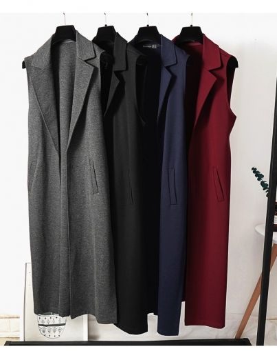 Дълъг вълнен елек с големи цепки отстрани