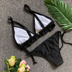 Черен бански с триъгълна чашка с харбали и бродерии рози