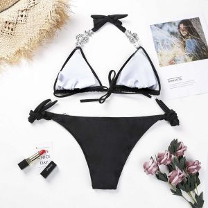 Черен бански с големи токи с цветни камъни