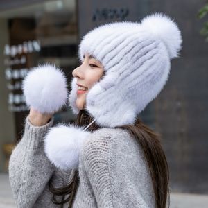 Зимна дамска шапка цялата от естествен  косъм норка с топчета лисица