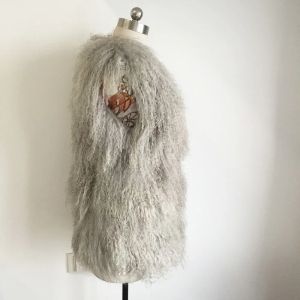 Дамски елек без ръкави от естествена овча кожа
